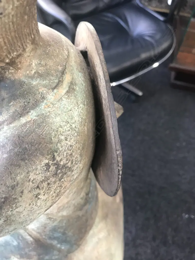 An old and well modelled bronze statue depicting the Zen Buddhist expression of spirit - Riding the Bull Home Image 1++