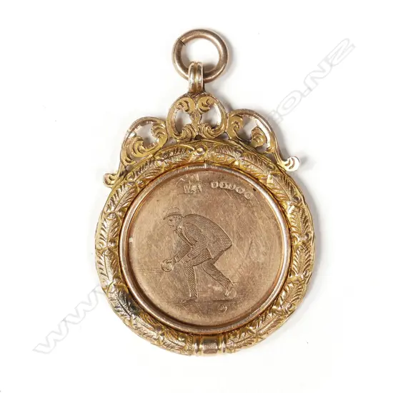 An Edwardian 9ct gold bowling medal