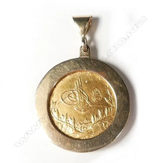 A Turkish gold 100 kurush coin in gold pendant mount