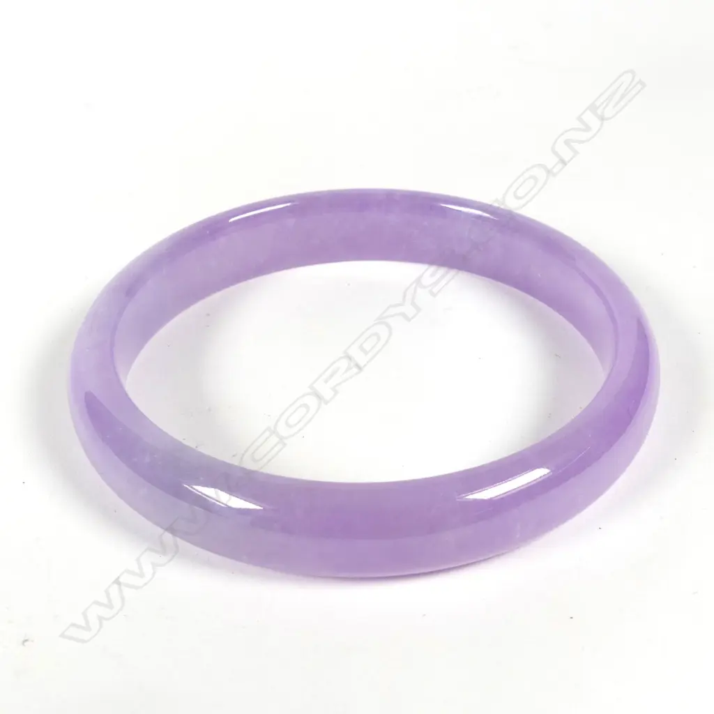 An uncommon mauve jade bangle Image 1++