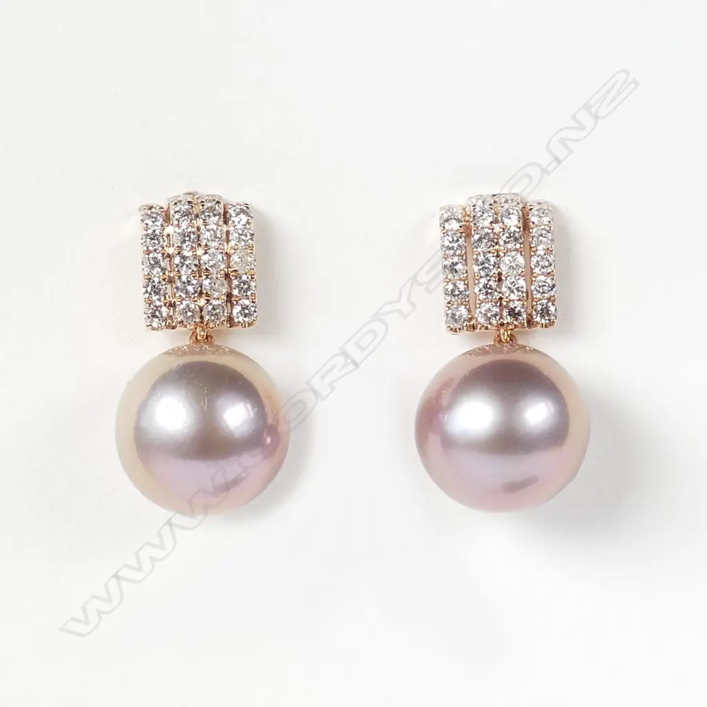 A pair of 14ct rose gold pink pearl and diamond earrings Image 1++