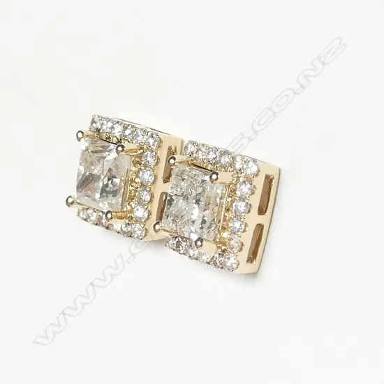 A pair of 14ct gold and diamond halo earrings