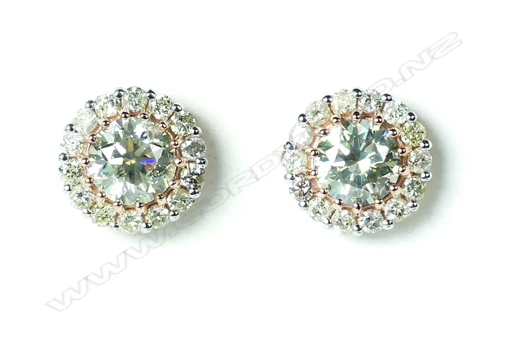 A pair of 14ct rose gold and diamond halo earrings Image 1++