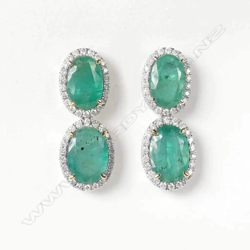 A pair of platinum emerald and diamond drop earrings Image 1++