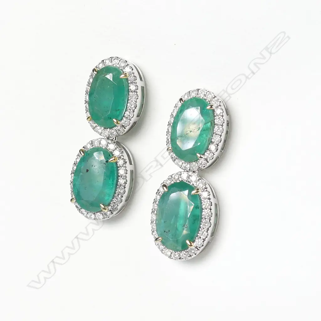 A pair of platinum emerald and diamond drop earrings Image 1++
