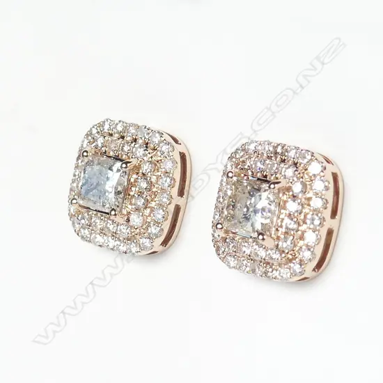A pair of 14ct rose gold and halo diamond earrings