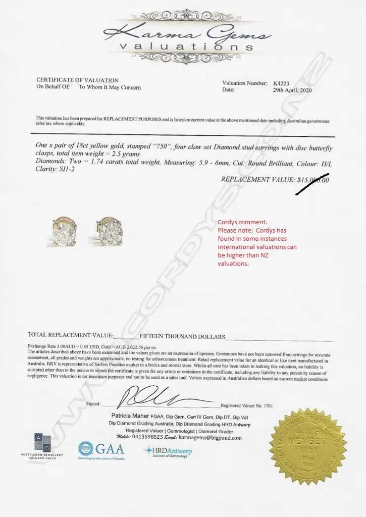 A pair of 18ct gold and diamond stud earrings Image 1++