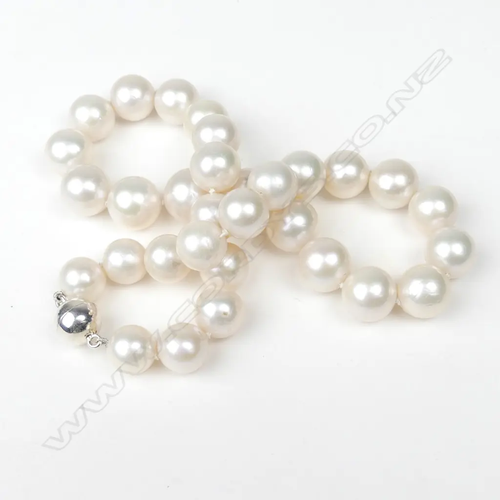 A cultured pearl necklace Image 1++