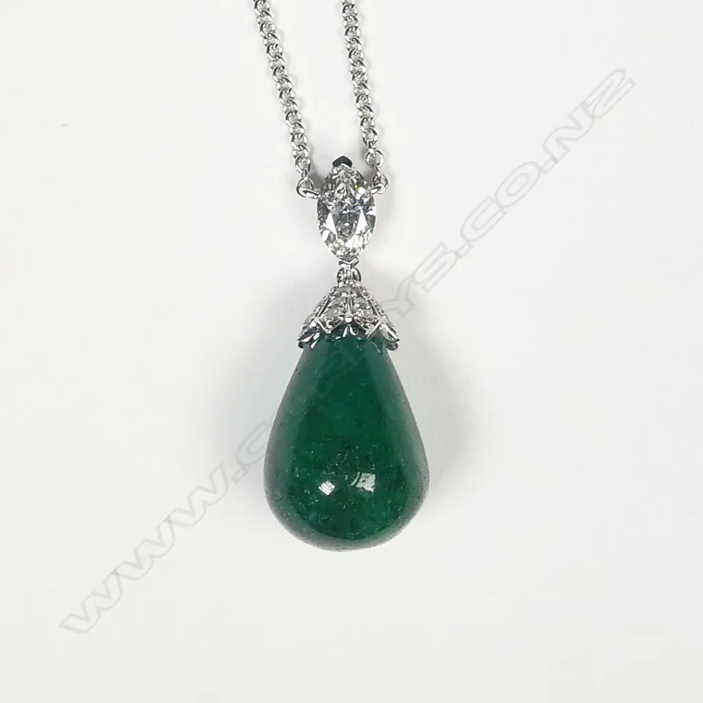 A 14ct white gold emerald and diamond Art Deco style pendant Image 1++