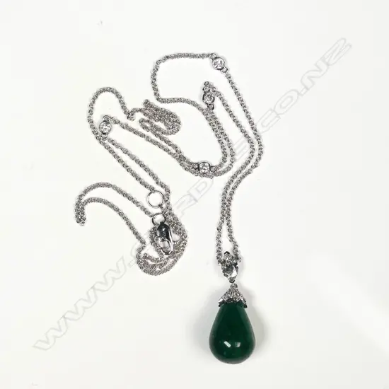 A 14ct white gold emerald and diamond Art Deco style pendant
