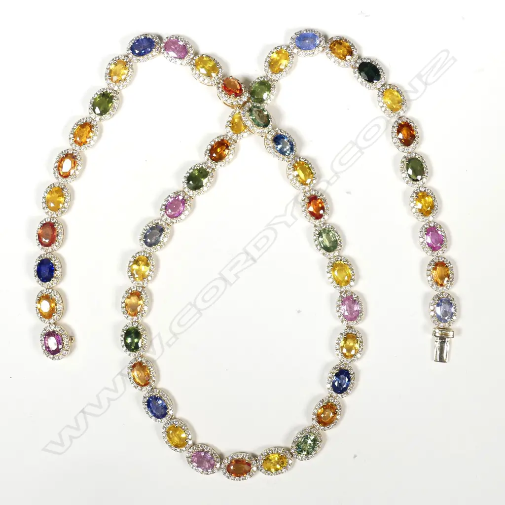 A 14ct gold sapphire and diamond necklace Image 1++