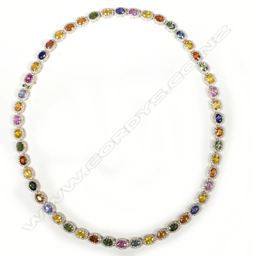 A 14ct gold sapphire and diamond necklace Image 1++