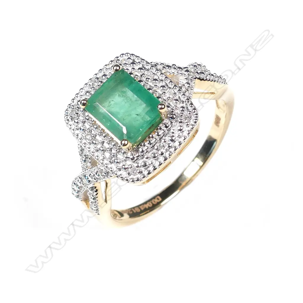 A 14ct gold emerald and diamond ring Image 1++