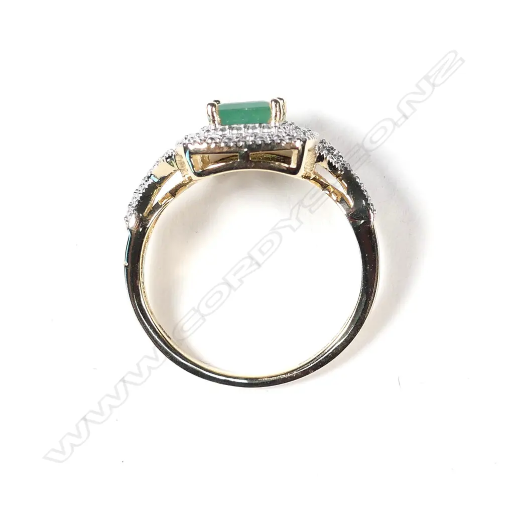 A 14ct gold emerald and diamond ring Image 1++