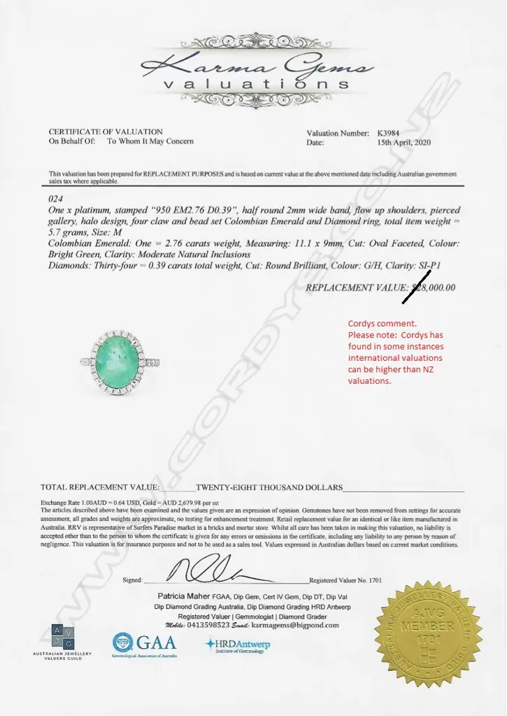 A platinum emerald and diamond ring Image 1++