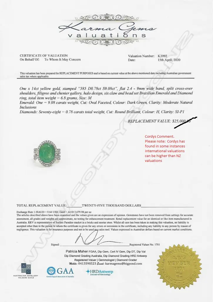 A 14ct gold emerald and diamond ring Image 1++