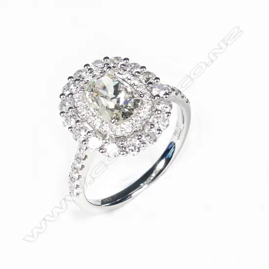 A 14ct white gold and diamond double halo ring
