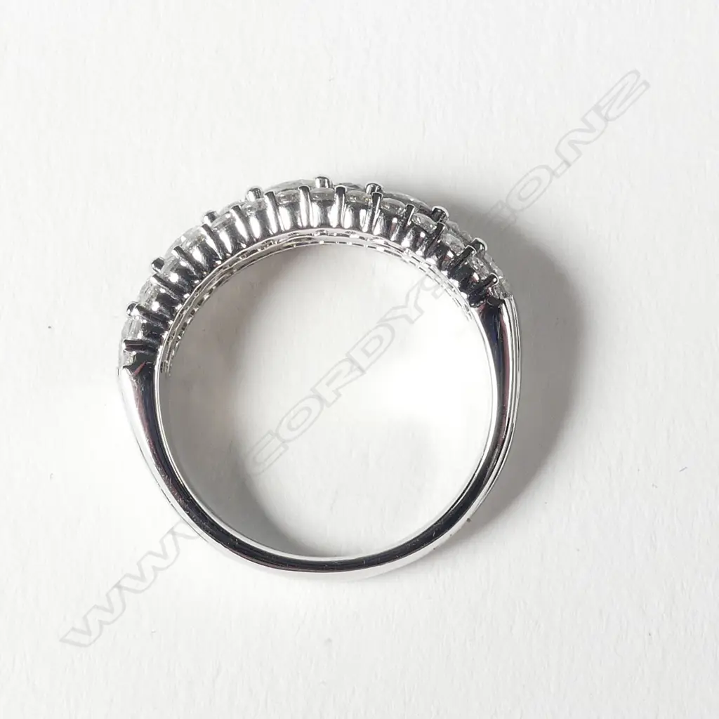 A platinum and diamond ring Image 1++