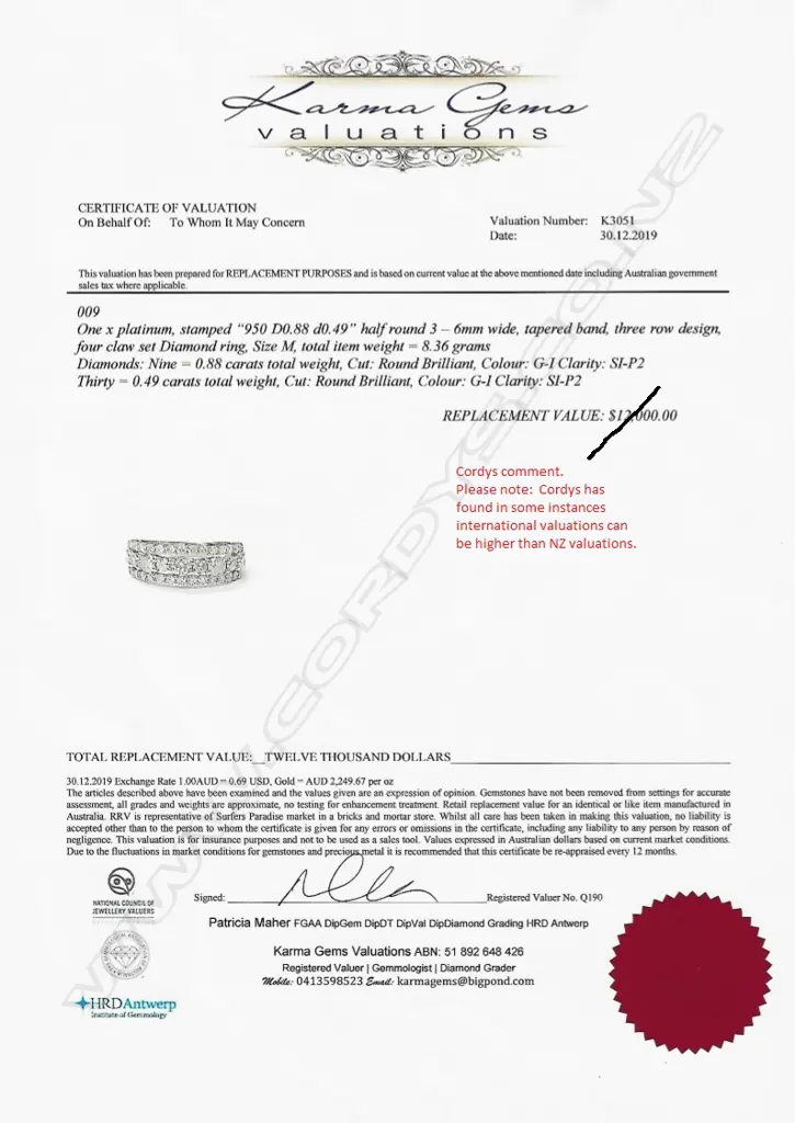 A platinum and diamond ring Image 1++