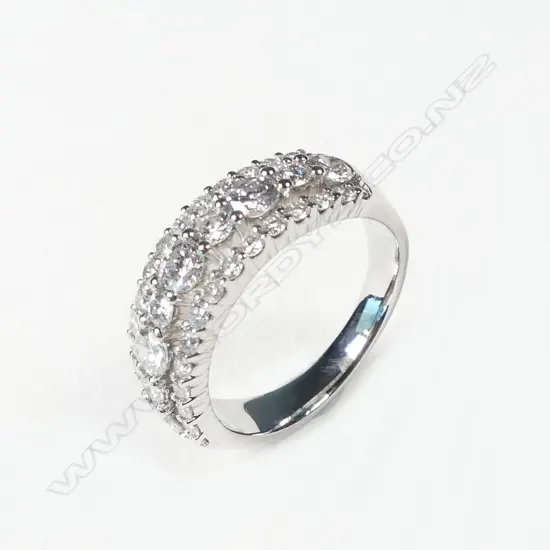 A platinum and diamond ring