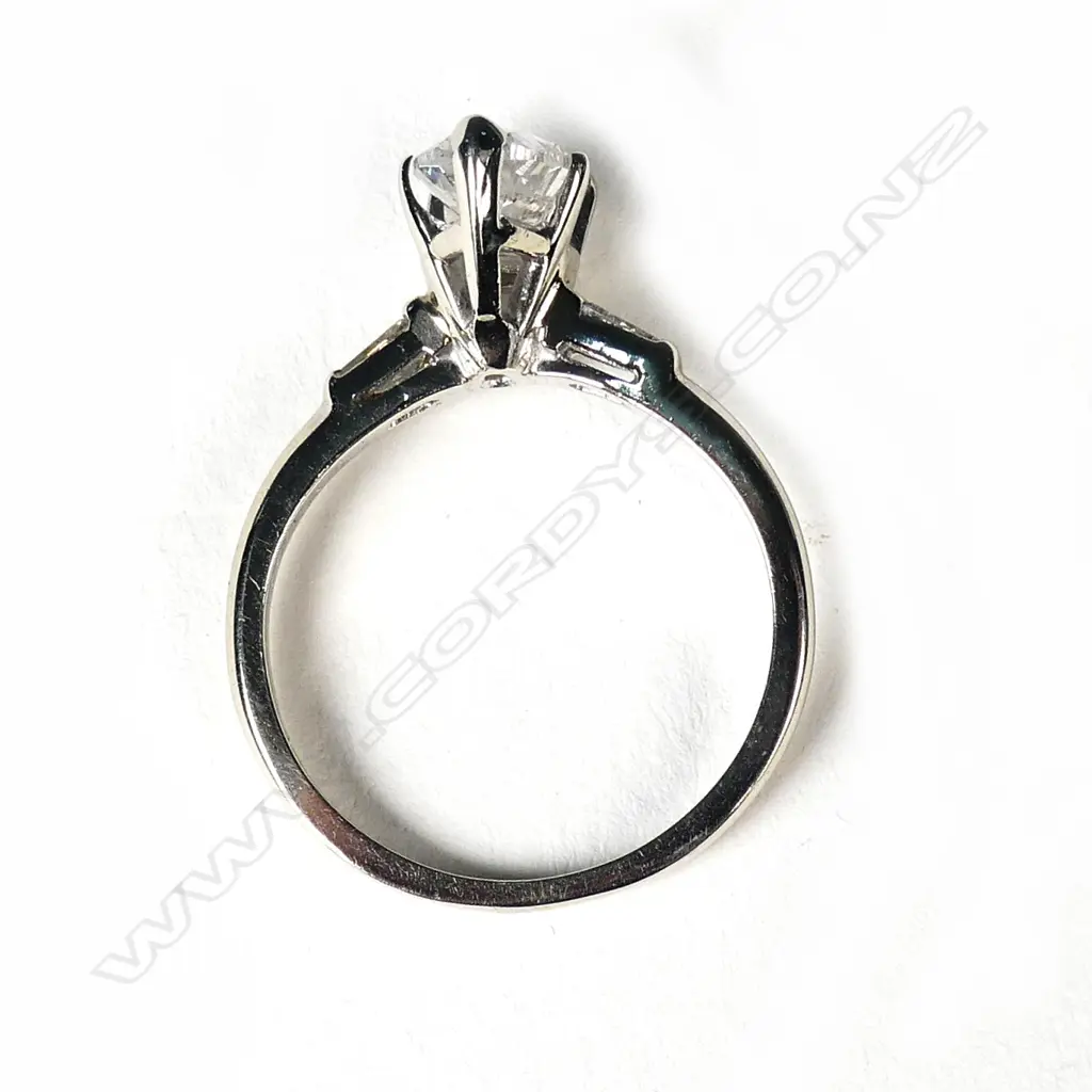 A 14ct white gold and diamond solitaire ring Image 1++