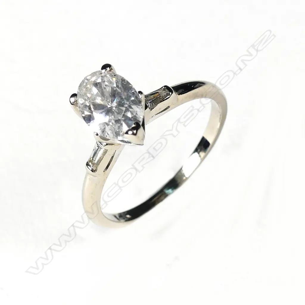 A 14ct white gold and diamond solitaire ring Image 1++