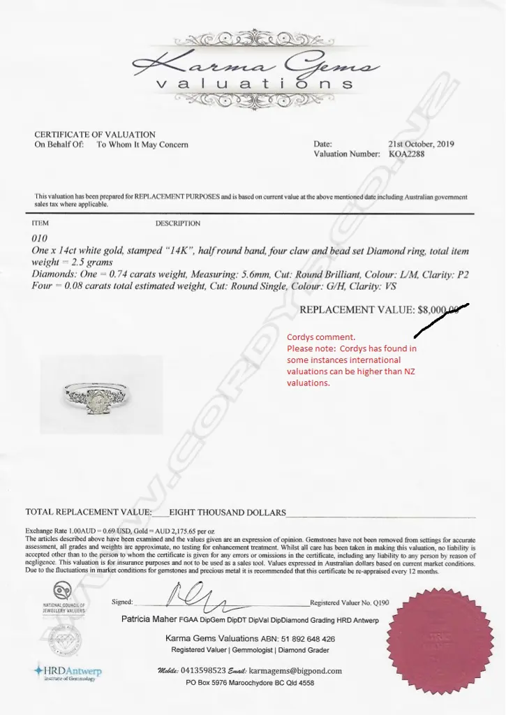 A 14ct white gold and diamond ring Image 1++