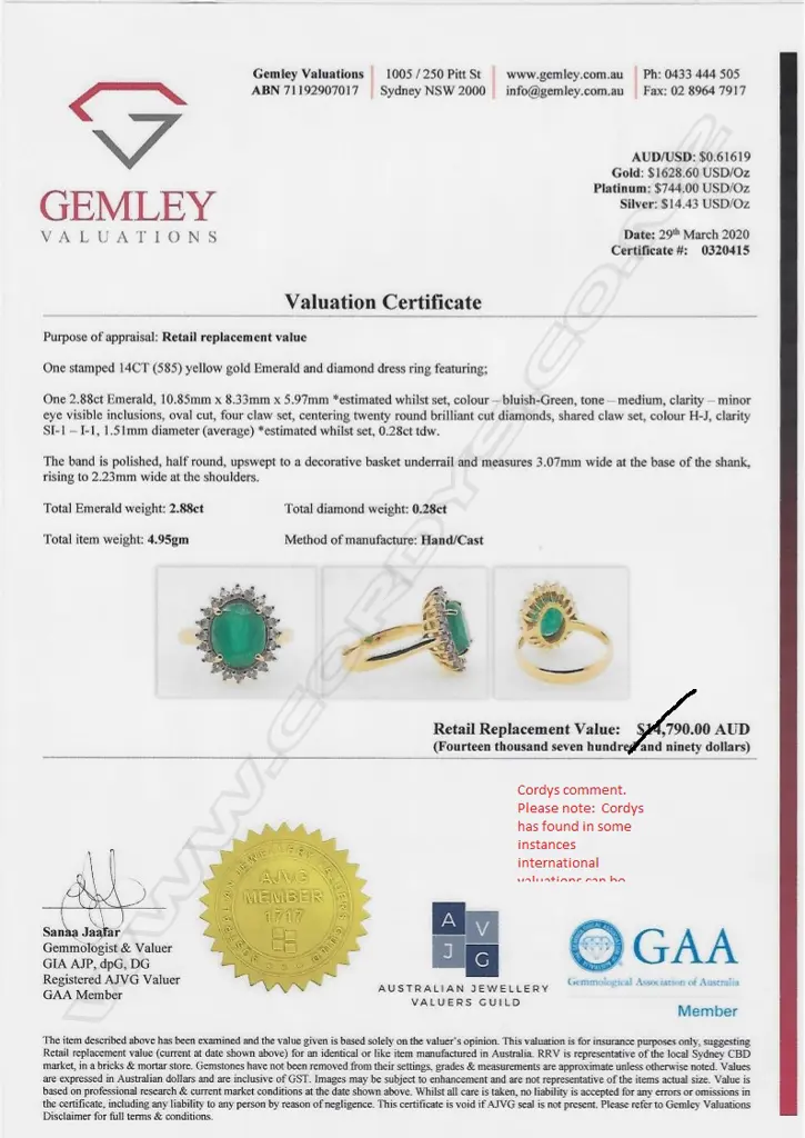 A 14ct gold emerald and diamond ring Image 1++