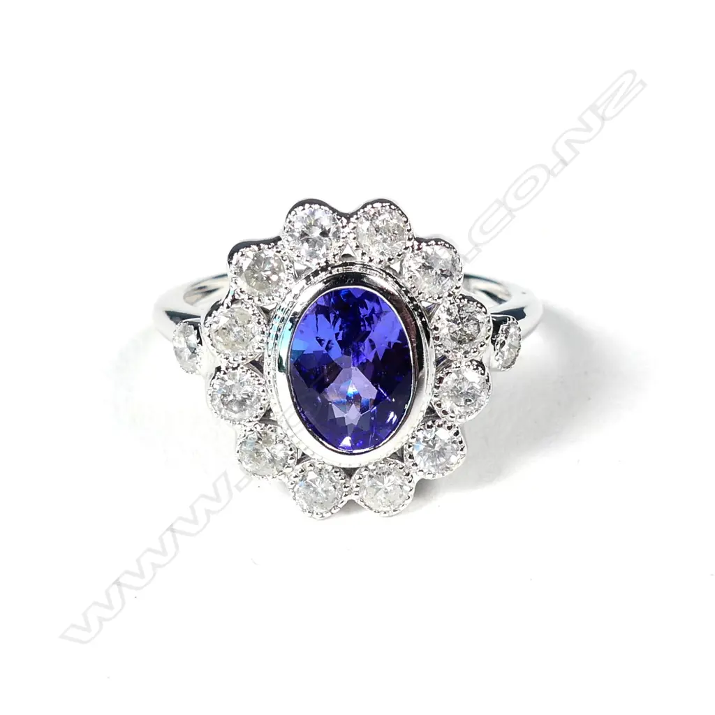 An 18ct white gold tanzanite and diamond ring Image 1++
