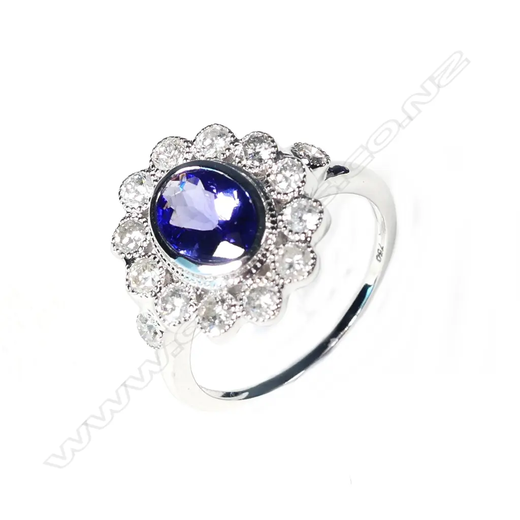 An 18ct white gold tanzanite and diamond ring Image 1++