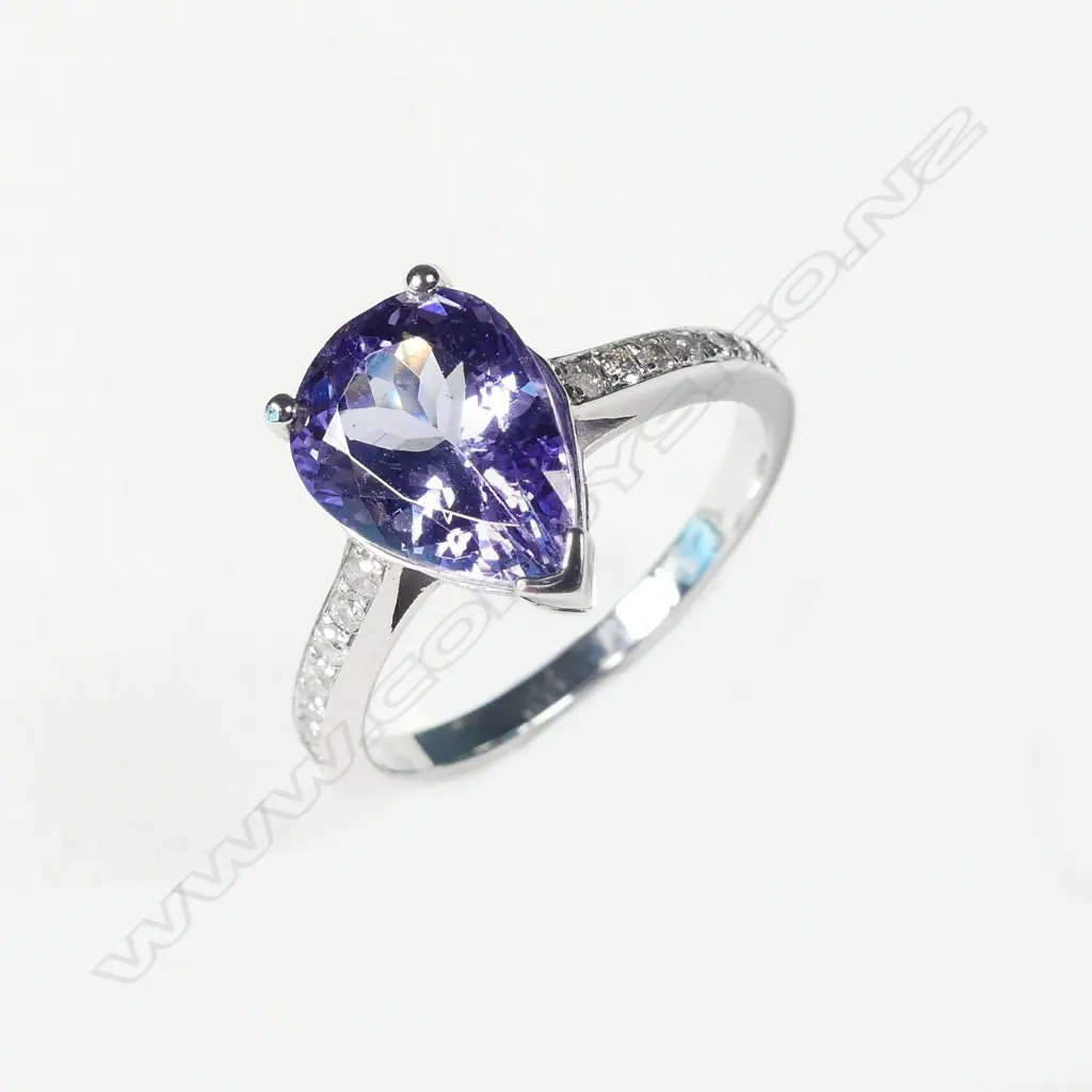 A 14ct white gold tanzanite and diamond ring Image 1++