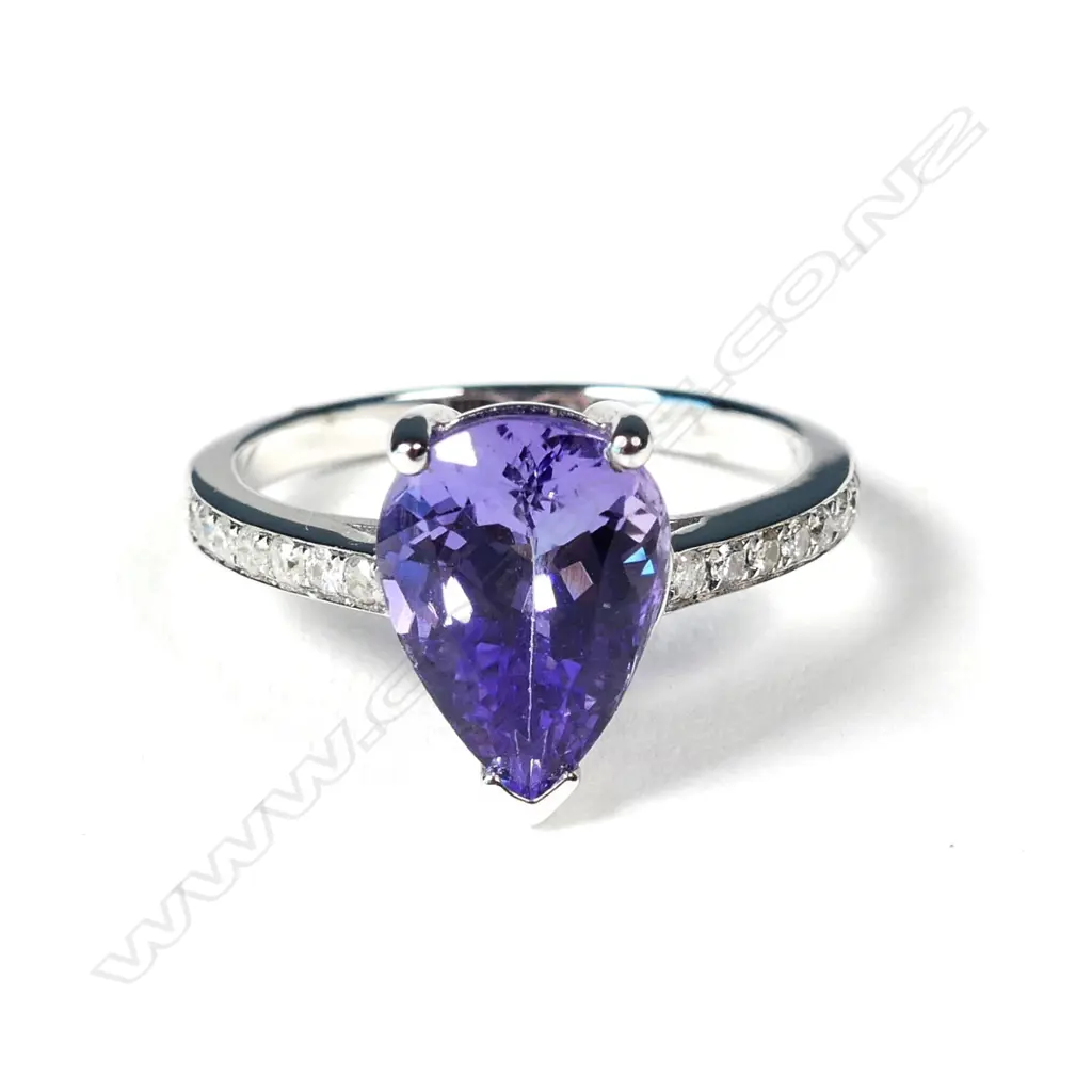 A 14ct white gold tanzanite and diamond ring Image 1++