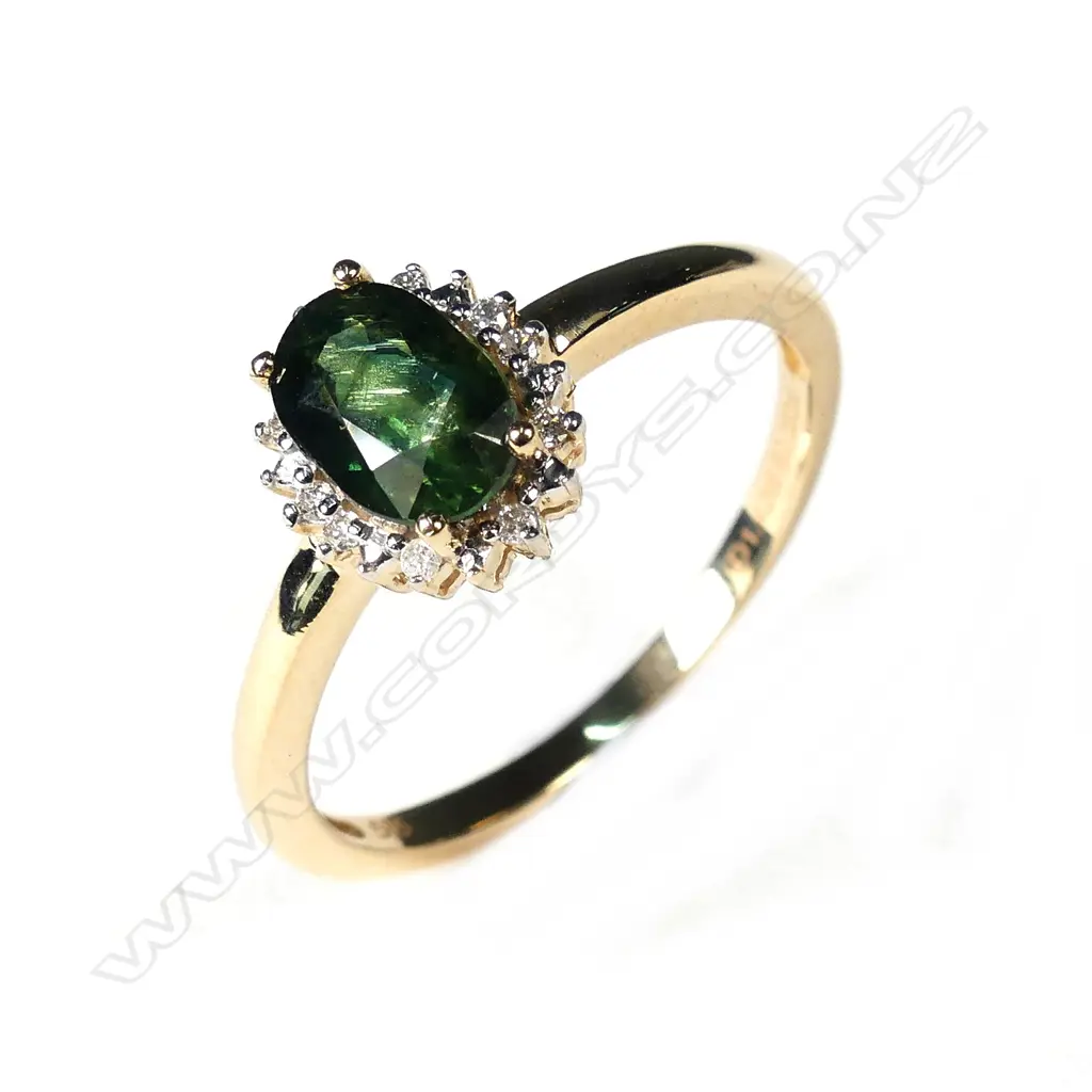 A 14ct gold sapphire and diamond ring Image 1++