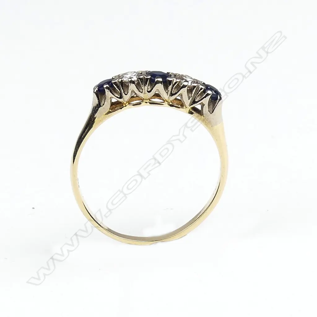 An estate 18ct. yellow gold sapphire and diamond ring Image 1++