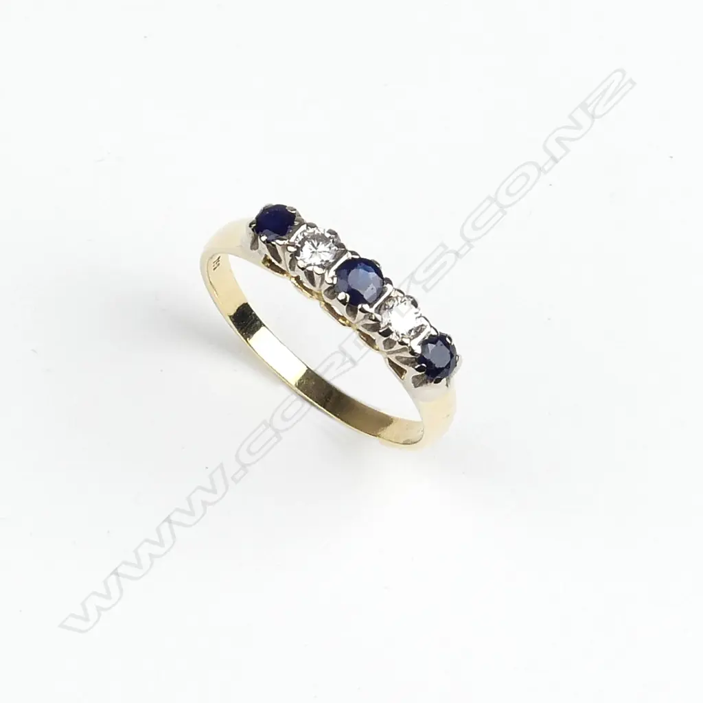 An estate 18ct. yellow gold sapphire and diamond ring Image 1++