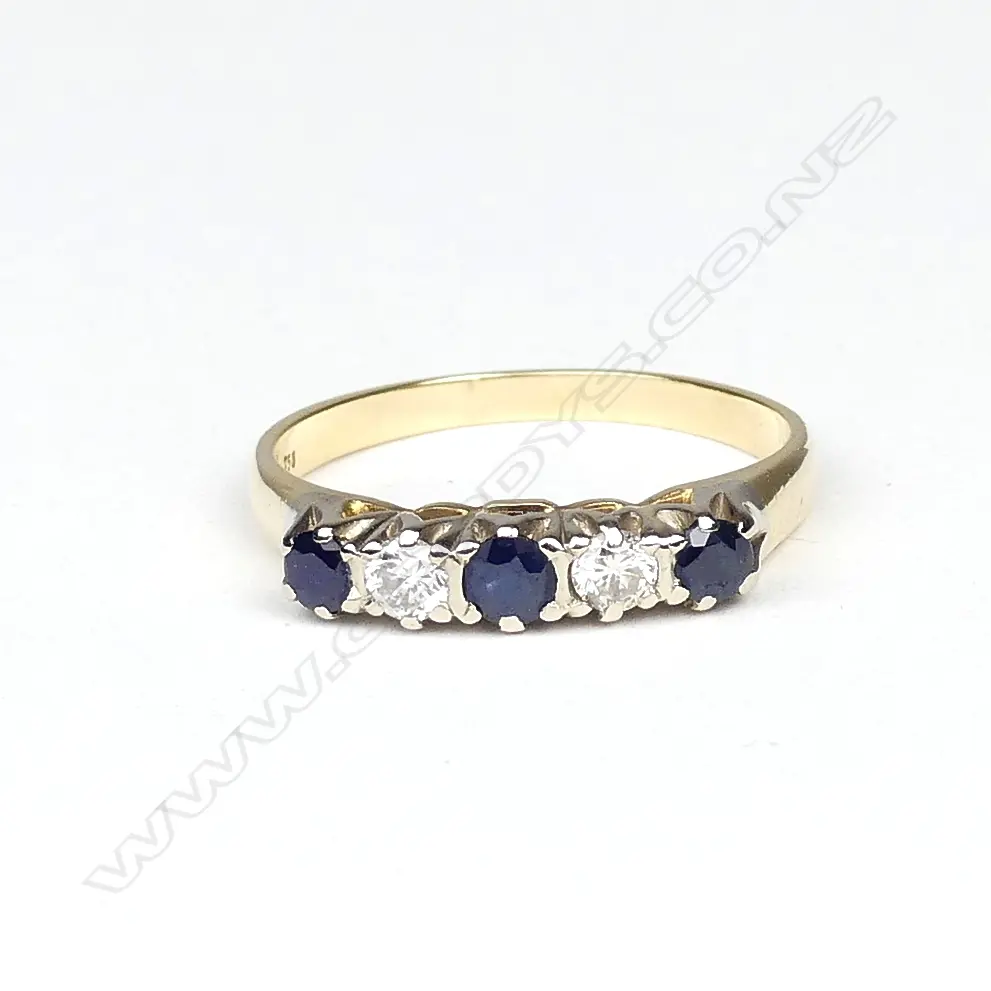 An estate 18ct. yellow gold sapphire and diamond ring Image 1++