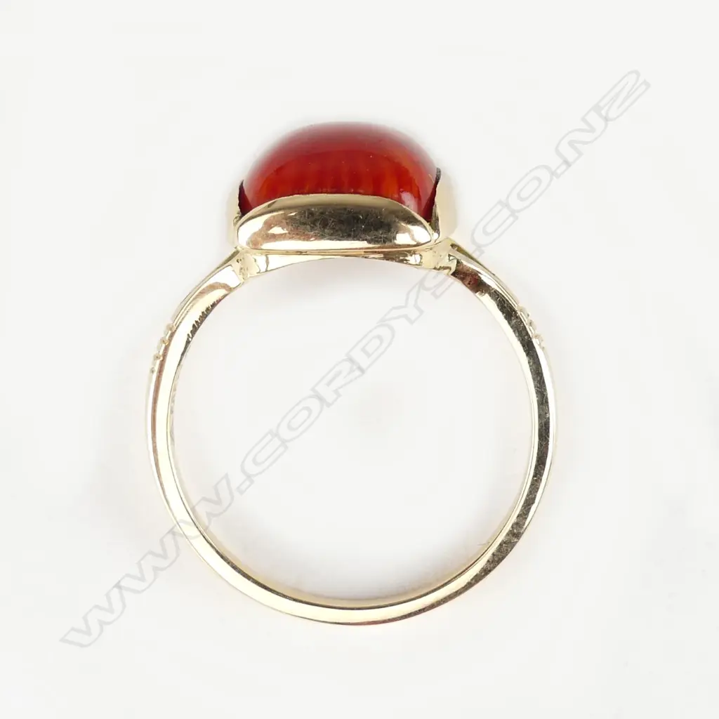 A 14ct. yellow gold and red coral dress ring Image 1++