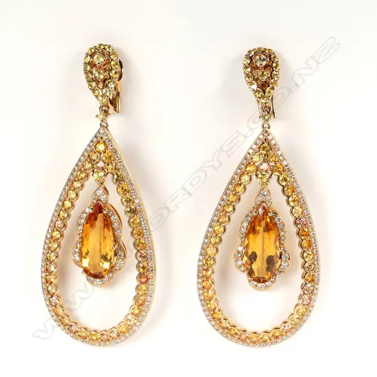 A pair of 18ct rose gold diamond sapphire and citrine earrings