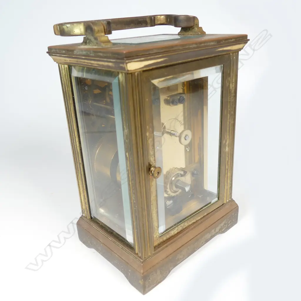 A brass cased carriage clock Image 1++