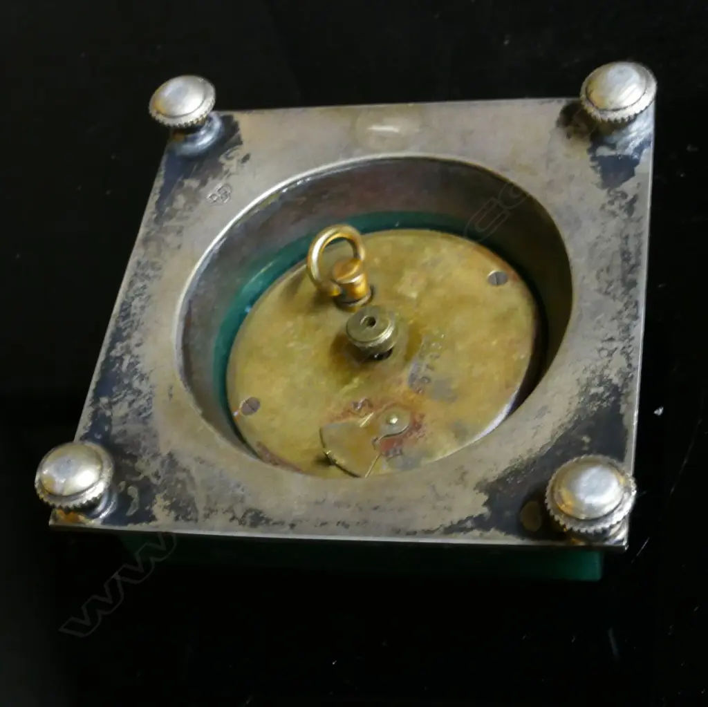 A Goldsmiths & Silversmiths Co. Ltd silver and adventurine table clock Image 1++