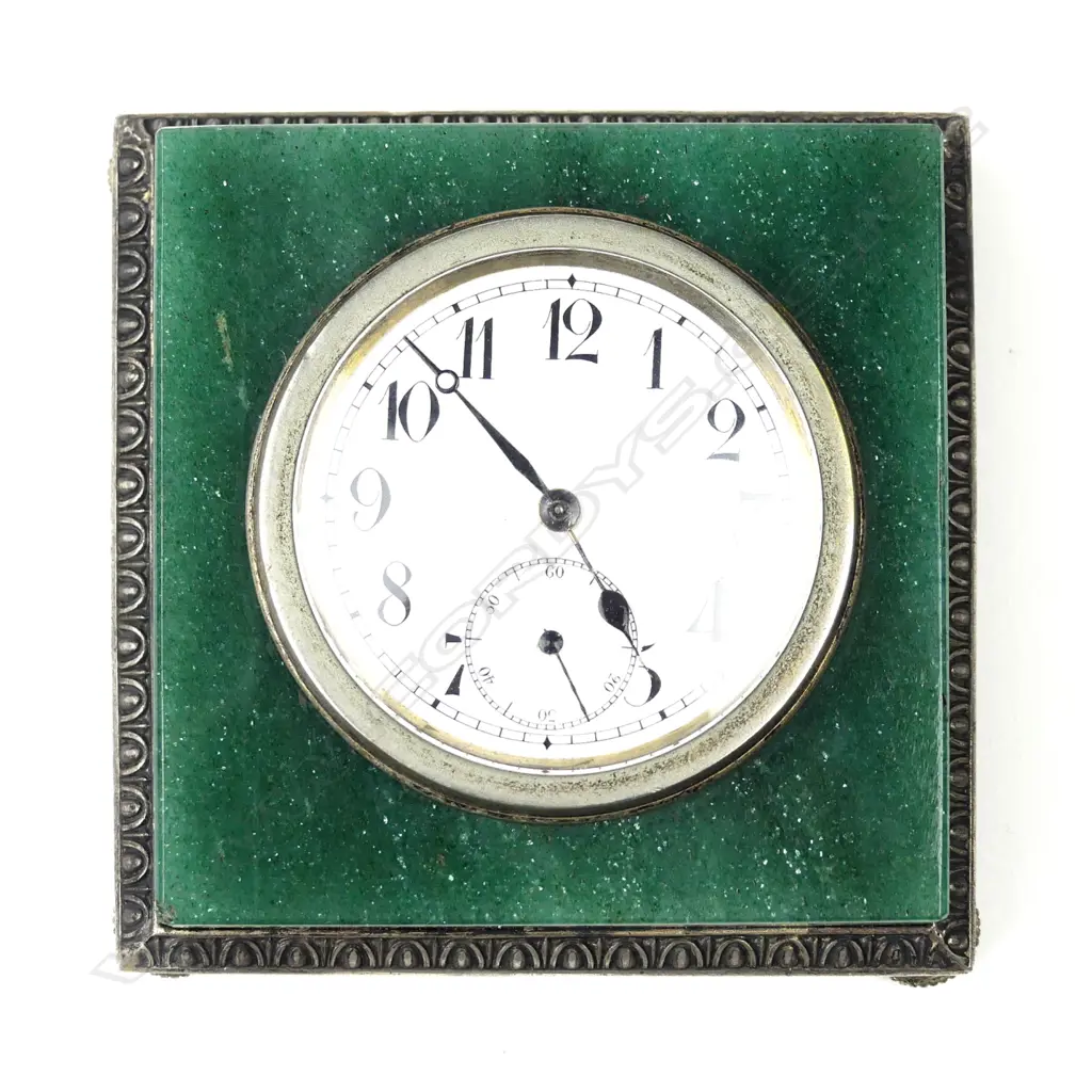 A Goldsmiths & Silversmiths Co. Ltd silver and adventurine table clock Image 1++