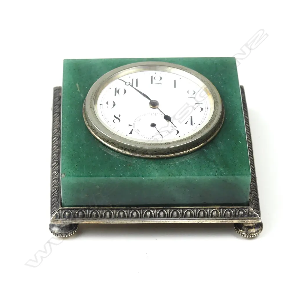 A Goldsmiths & Silversmiths Co. Ltd silver and adventurine table clock Image 1++