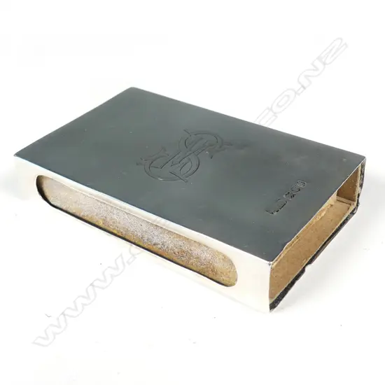 A silver match box frame