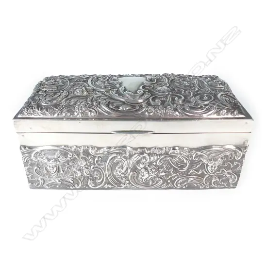 A Victorian silver fancy embossed playing card box