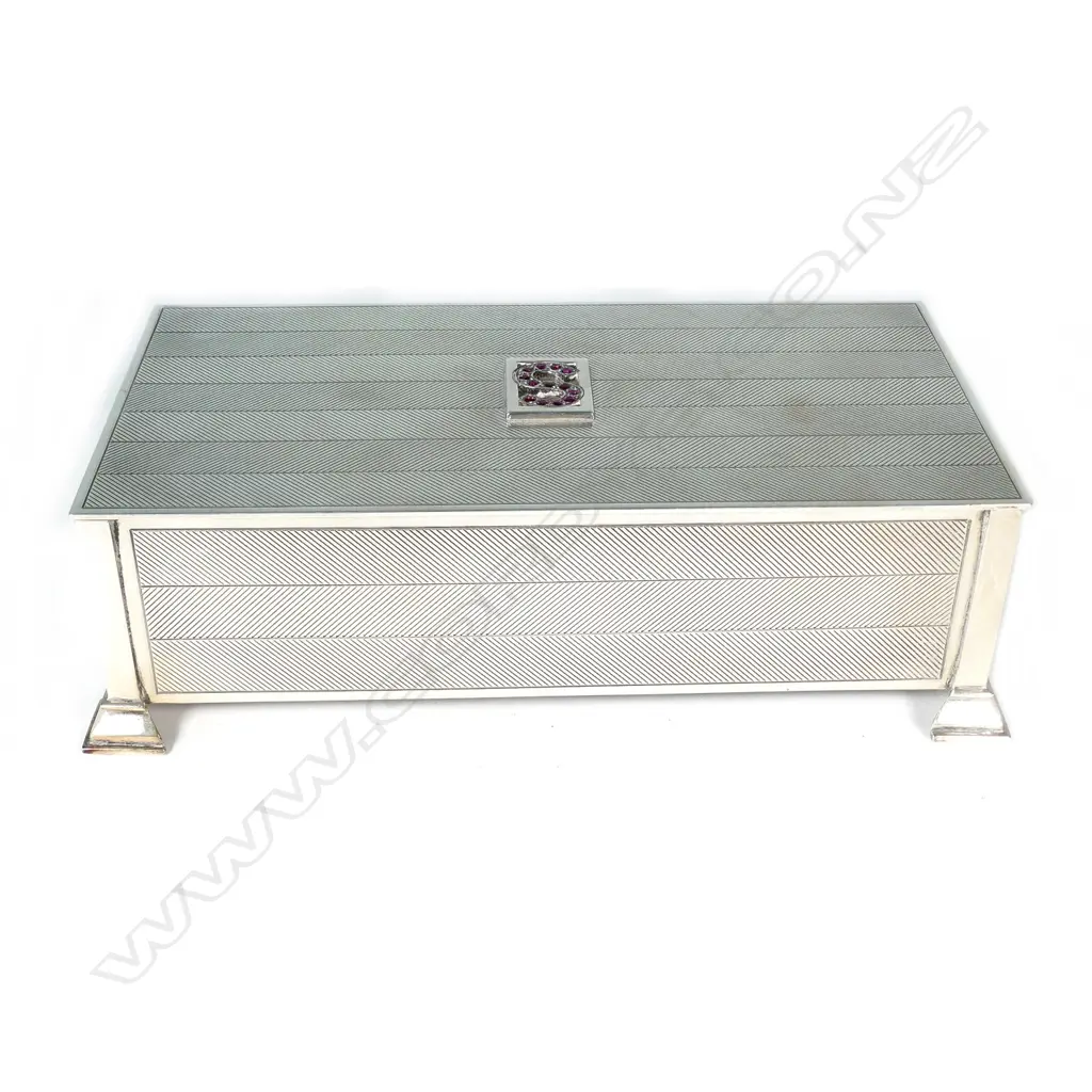 A mid 20thC silver cigarette box Image 1++