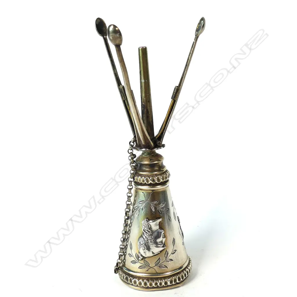 An uncommon unmarked silver posy holder Image 1++