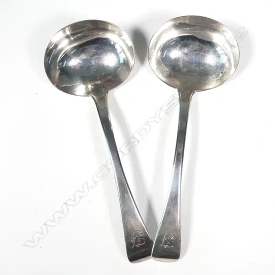 A pair of George IV silver sauce ladles