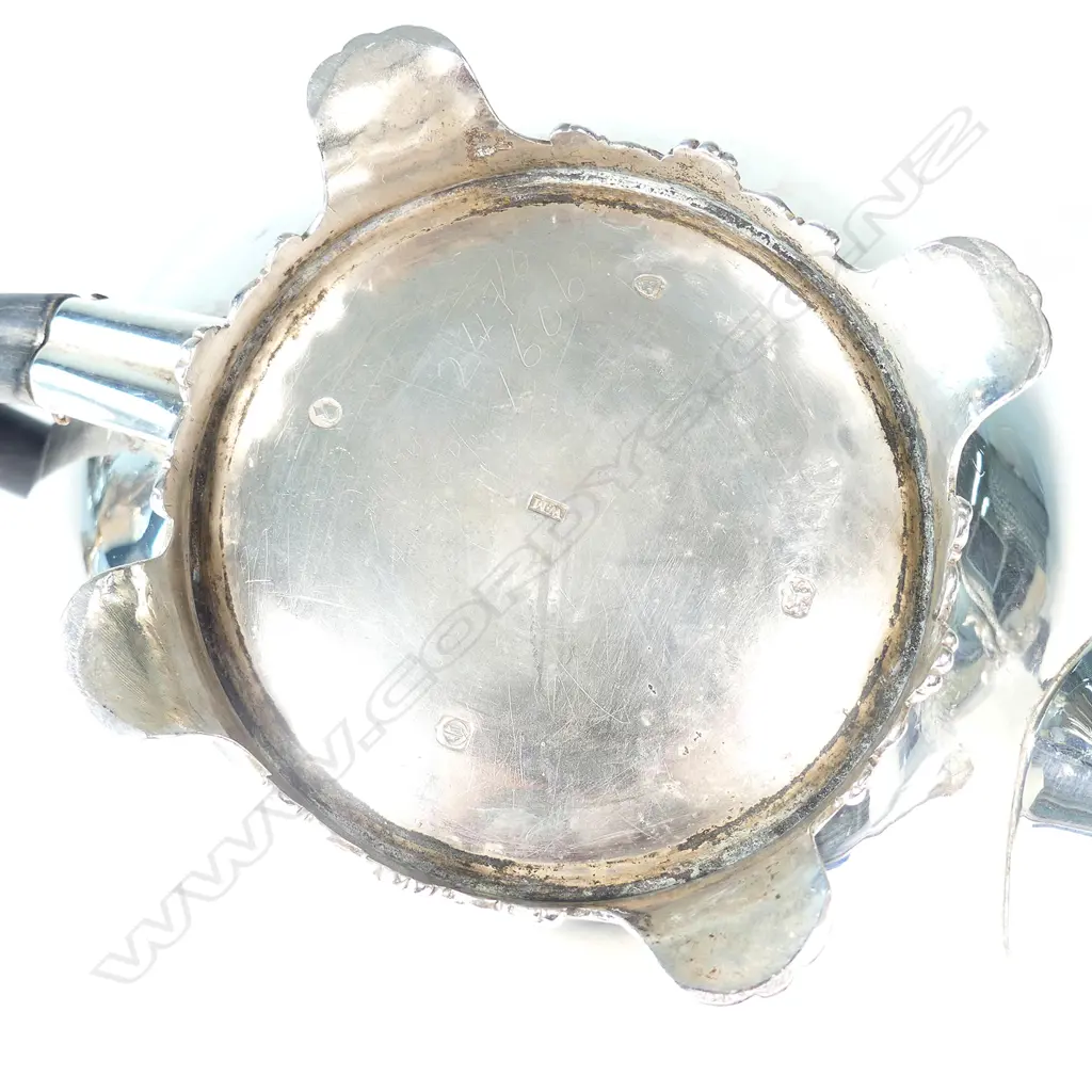 A Victorian silver teapot Image 1++