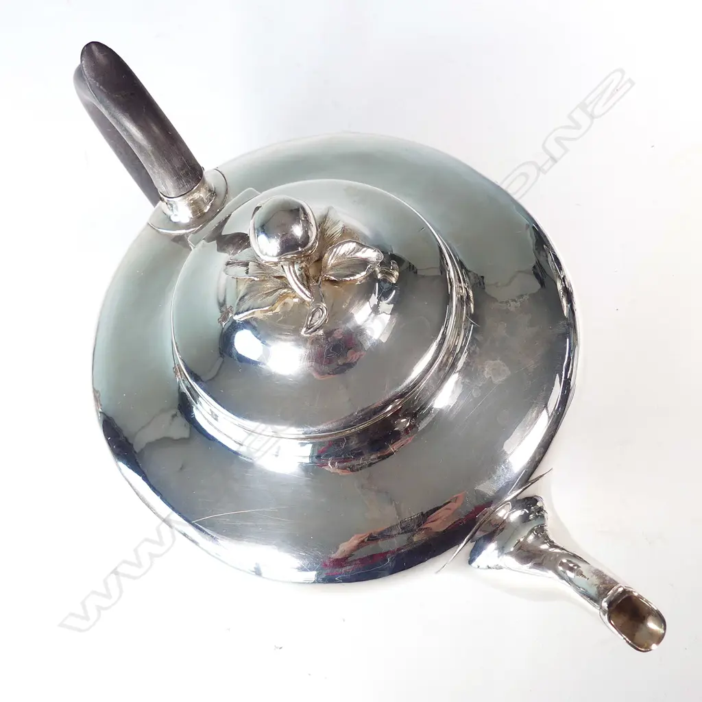 A Victorian silver teapot Image 1++