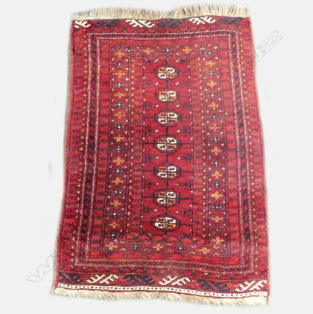 A small hand knotted Persian Turkman rug Image 1++